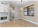 Dining area with a modern pendant light fixture and view of the lanai and pool at 2523 Dixon Ter, Port Charlotte, FL 33981