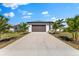 Beautiful home with a private driveway and a spacious two-car garage at 2523 Dixon Ter, Port Charlotte, FL 33981