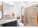Bathroom featuring a shower and granite countertop vanity at 25325 Longmeadow Dr, Punta Gorda, FL 33955