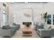Elegant lobby with comfortable seating, fireplace, and stylish decor at 25325 Longmeadow Dr, Punta Gorda, FL 33955
