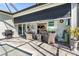 Covered patio area with open blinds and a grill at 25325 Longmeadow Dr, Punta Gorda, FL 33955