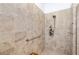 Walk-in shower with bench seating, grab bar, and built in shelving at 25325 Longmeadow Dr, Punta Gorda, FL 33955