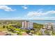 Wide aerial view with water in the background and the building in the foreground at 2625 Terra Ceia Bay Blvd # 206, Palmetto, FL 34221