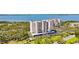 Aerial view of the building showcasing landscaping, parking and water views at 2625 Terra Ceia Bay Blvd # 206, Palmetto, FL 34221