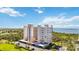 Aerial view of building with lush landscaping and water views at 2625 Terra Ceia Bay Blvd # 206, Palmetto, FL 34221