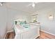 Cozy bedroom with a full-sized bed, a ceiling fan, and a dresser at 2625 Terra Ceia Bay Blvd # 206, Palmetto, FL 34221