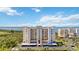 View of a multi-story residential building with water views and parking at 2625 Terra Ceia Bay Blvd # 206, Palmetto, FL 34221