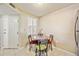 Cozy dining area features tile floors, natural light, and seating for four at 2625 Terra Ceia Bay Blvd # 206, Palmetto, FL 34221
