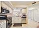 The well-maintained kitchen features stainless appliances, tile flooring, and ample counter space at 2625 Terra Ceia Bay Blvd # 206, Palmetto, FL 34221