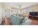 Inviting living room featuring comfortable sofas, large windows, and a television at 2625 Terra Ceia Bay Blvd # 206, Palmetto, FL 34221