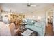 Living room and dining area feature an open floor plan and comfortable seating at 2625 Terra Ceia Bay Blvd # 206, Palmetto, FL 34221
