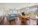 Living room and dining area with hardwood floors, open floorplan, and great views at 2625 Terra Ceia Bay Blvd # 206, Palmetto, FL 34221