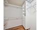 Spacious walk-in closet featuring built-in shelving and wire racks for organized storage solutions at 2625 Terra Ceia Bay Blvd # 206, Palmetto, FL 34221