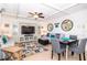 Living room featuring stylish furniture, a flat-screen TV, and a comfortable seating area, perfect for relaxing at 3000 Gulf Dr # 3, Holmes Beach, FL 34217