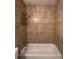 Elegant bathroom featuring a tiled shower, offering a clean and modern aesthetic at 306 Barlow Ave # 77, Sarasota, FL 34232