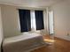 Bright bedroom featuring natural light and wood floors, creating a serene and comfortable atmosphere at 306 Barlow Ave # 77, Sarasota, FL 34232