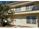 Charming exterior view of this two-story home with a well-kept facade and inviting curb appeal at 306 Barlow Ave # 77, Sarasota, FL 34232