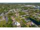 Neighborhood aerial view displaying homes, landscaping, and community layout at 3640 Aster Dr, Sarasota, FL 34233