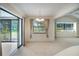 Dining area with sliding glass doors and view, perfect for entertaining at 3640 Aster Dr, Sarasota, FL 34233