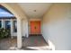 Inviting covered entryway featuring a set of bright double doors and neutral exterior paint at 3640 Aster Dr, Sarasota, FL 34233