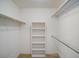 Spacious walk-in closet with shelving, offering ample storage space at 3640 Aster Dr, Sarasota, FL 34233