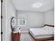Comfortable bedroom with neutral tones, plush carpeting, and a vintage vanity at 3663 Quiet Dr, Sarasota, FL 34240
