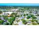 Overhead captures community, showcasing residences with pools near schools and recreational areas at 4008 Cape Vista Dr, Bradenton, FL 34209