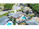 Aerial view highlights the backyard pool, patio area, privacy fence and roof at 4008 Cape Vista Dr, Bradenton, FL 34209