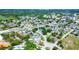 An aerial neighborhood shot of residential homes and tree lined streets at 4008 Cape Vista Dr, Bradenton, FL 34209