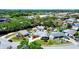 A lovely single-story home with a private pool, driveway, landscaped yard, and a white perimeter fence at 4008 Cape Vista Dr, Bradenton, FL 34209
