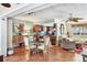 Charming living and dining area featuring tile floors, comfortable seating, and open layout at 4008 Cape Vista Dr, Bradenton, FL 34209