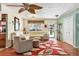 Inviting living room filled with natural light and comfortable seating arrangement, creating a cozy and welcoming atmosphere at 4008 Cape Vista Dr, Bradenton, FL 34209
