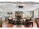Bright and comfortable living room with stone fireplace and comfortable seating at 4008 Cape Vista Dr, Bradenton, FL 34209