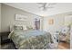 Bedroom with a soft rug, comfy armchair, and neutral paint at 4451 Atwood Cay Cir # 7, Sarasota, FL 34233