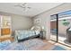 Bright bedroom with a sliding glass door to the outdoor patio at 4451 Atwood Cay Cir # 7, Sarasota, FL 34233