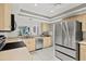 Modern kitchen featuring stainless steel appliances and plenty of counter space at 4451 Atwood Cay Cir # 7, Sarasota, FL 34233