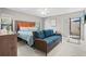Bright main bedroom with a sliding glass door to outdoor patio at 4451 Atwood Cay Cir # 7, Sarasota, FL 34233