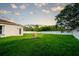 Expansive backyard offering ample space for outdoor activities and relaxation with verdant green lawn at 4706 Cayo Costa Pl, Bradenton, FL 34203