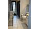 Functional bathroom layout with a toilet, shower, and vanity offering essential amenities for a comfortable living space at 4706 Cayo Costa Pl, Bradenton, FL 34203
