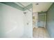 Bright bathroom featuring a shower with white tiling at 4706 Cayo Costa Pl, Bradenton, FL 34203