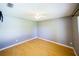 Empty bedroom featuring hardwood floors and a ceiling fan at 4706 Cayo Costa Pl, Bradenton, FL 34203