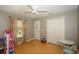 This bedroom features a neutral wall, a ceiling fan, and a double door closet at 4706 Cayo Costa Pl, Bradenton, FL 34203