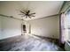 Spacious living room featuring stylish floors and a modern ceiling fan for comfort at 4706 Cayo Costa Pl, Bradenton, FL 34203