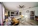 Spacious living room featuring a view into the kitchen at 4706 Cayo Costa Pl, Bradenton, FL 34203