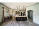 Open-concept living space showcasing modern kitchen and spacious living room at 4706 Cayo Costa Pl, Bradenton, FL 34203