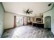 Open-concept living space showcasing modern kitchen and spacious living room at 4706 Cayo Costa Pl, Bradenton, FL 34203