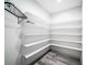 Walk-in pantry featuring custom shelving, ideal for optimized storage at 4706 Cayo Costa Pl, Bradenton, FL 34203