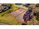Aerial view of community tennis courts, perfect for sports enthusiasts and active lifestyles at 4706 Cayo Costa Pl, Bradenton, FL 34203
