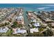 Aerial view of waterfront home with boat dock and canal access to the bay at 500 Halyard Ln, Longboat Key, FL 34228