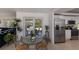 Eat-in kitchen with stainless steel appliances and granite countertops with door to backyard at 500 Halyard Ln, Longboat Key, FL 34228
